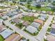 Aerial view of a well-maintained residential neighborhood with green lawns and mature trees at 2235 Harbor Town Ln, Lakeland, FL 33810