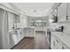 Bright kitchen featuring stainless steel appliances, white cabinets, and an undermount sink at 2235 Harbor Town Ln, Lakeland, FL 33810