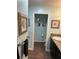 Bathroom featuring seashell decor and a granite vanity with a white sink at 2441 Nellie Rd, The Villages, FL 32163