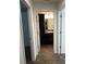 Hallway with a view of the bathroom at 2441 Nellie Rd, The Villages, FL 32163