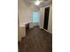 Office with a built-in desk, drawers, cabinets and wood flooring at 2441 Nellie Rd, The Villages, FL 32163