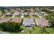 This home boasts a well-maintained lawn, screened in porch, and mature trees within a quiet neighborhood at 2738 Morven Park Way, The Villages, FL 32162