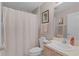 Cozy bathroom featuring vanity, mirror, and shower with curtain at 2738 Morven Park Way, The Villages, FL 32162