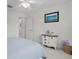 Comfortable bedroom features calming color palette and natural light at 2738 Morven Park Way, The Villages, FL 32162
