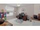 Bedroom with desk, drawers, and large windows at 2738 Morven Park Way, The Villages, FL 32162
