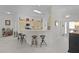 Bright kitchen featuring a breakfast bar with seating, modern appliances, and ample counter space at 2738 Morven Park Way, The Villages, FL 32162