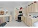 Well-equipped kitchen features stainless steel appliances and ample counter space for cooking at 2738 Morven Park Way, The Villages, FL 32162