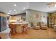 Open-concept living room featuring an eat-in kitchen, living area, and views to the other rooms at 2766 Privada Dr, The Villages, FL 32162