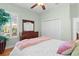 Bright bedroom with a ceiling fan, plantation shutters and a closet at 2904 Avalos Dr, The Villages, FL 32162