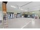 Large garage space with plenty of room for storage, tools, and utility vehicles at 2904 Avalos Dr, The Villages, FL 32162