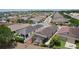 Aerial view of a well-maintained neighborhood featuring neatly arranged homes and streets at 2967 Thayer Ter, The Villages, FL 32163