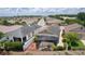 Charming aerial view of homes with manicured lawns and screened lanais in a Gathering-friendly neighborhood at 2967 Thayer Ter, The Villages, FL 32163