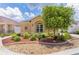 Charming single-story home featuring a well-maintained lawn and mature landscaping at 2967 Thayer Ter, The Villages, FL 32163
