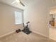 Spare room staged as an exercise room with window and stationary bike at 3181 Hill Point St, Minneola, FL 34715