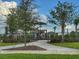 Charming community playground with secure fencing and landscaping, offering a safe play area at 3181 Hill Point St, Minneola, FL 34715