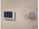 Smart home features: Programmable thermostat and IQ Panel enhance comfort and security at 3181 Hill Point St, Minneola, FL 34715