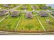 Aerial view of a home with a spacious backyard, showcasing its location within a residential community at 3222 San Leo Dr, Orlando, FL 32820