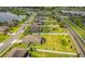 Expansive aerial view of a residential neighborhood with large lots and community lakes at 3222 San Leo Dr, Orlando, FL 32820