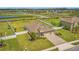 Exterior of a well-maintained home with a manicured lawn and a paver driveway at 3222 San Leo Dr, Orlando, FL 32820