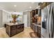 Spacious kitchen features a center island, stainless steel appliances, and granite countertops at 3222 San Leo Dr, Orlando, FL 32820