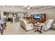 Inviting living space with open layout, comfortable sofas, and seamless flow to the kitchen at 3222 San Leo Dr, Orlando, FL 32820