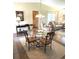 Dining room featuring a glass table and view into the living room at 3337 Candlebrook St, The Villages, FL 32162