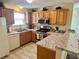 Bright kitchen featuring stainless steel appliances and granite countertops at 3337 Candlebrook St, The Villages, FL 32162