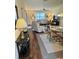 Bright living room with open floor plan and wood flooring at 3337 Candlebrook St, The Villages, FL 32162