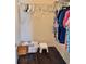 Spacious walk-in closet with ample hanging space and convenient organizing accessories at 3337 Candlebrook St, The Villages, FL 32162