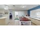 Dining area with view to patio features sliding glass doors for lots of natural light at 33913 Sabal Way, Leesburg, FL 34748
