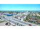 Aerial shot of community near beach, Intracoastal Waterway, bridge, and local businesses at 3425 S Atlantic Ave # 1101, Daytona Beach, FL 32118
