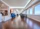 Expansive dining area boasting elegant wood flooring, a bar area, and stunning ocean views from large windows at 3425 S Atlantic Ave # 1101, Daytona Beach, FL 32118
