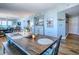 Spacious dining room with seating for six and view of living area at 3425 S Atlantic Ave # 1101, Daytona Beach, FL 32118