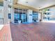 Welcoming entrance to resort with glass doors and brick paving at 3425 S Atlantic Ave # 1101, Daytona Beach, FL 32118