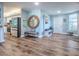 Inviting foyer with hardwood floors, hall tree, and convenient access to the kitchen at 3425 S Atlantic Ave # 1101, Daytona Beach, FL 32118