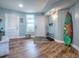 Spacious foyer with hardwood floors and coastal decor creating a relaxing atmosphere at 3425 S Atlantic Ave # 1101, Daytona Beach, FL 32118