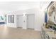 Hallway featuring elevators, artwork, and stylish furnishings that create an inviting atmosphere at 3425 S Atlantic Ave # 1101, Daytona Beach, FL 32118
