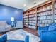 Cozy library space with floor-to-ceiling bookshelves and comfortable seating arrangements for reading and relaxing at 3425 S Atlantic Ave # 1101, Daytona Beach, FL 32118