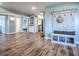 Open-concept living area featuring hardwood floors and coastal-inspired decorations at 3425 S Atlantic Ave # 1101, Daytona Beach, FL 32118