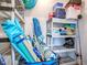 Efficient storage with shelving holding beach equipment and supplies at 3425 S Atlantic Ave # 1101, Daytona Beach, FL 32118