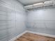 Empty walk-in closet with white wire shelving and wood-look floor at 3425 S Atlantic Ave # 1101, Daytona Beach, FL 32118