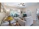Comfortable living room showcasing the furniture arrangement and natural light at 3607 Fairfield Dr, Clermont, FL 34711