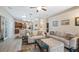 Bright living room features modern sofas, recessed lighting, and an open floor plan at 3607 Fairfield Dr, Clermont, FL 34711