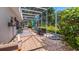 Outdoor patio perfect for entertaining with tiled flooring, and privacy screening at 3607 Fairfield Dr, Clermont, FL 34711