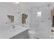 Modern bathroom featuring a glass shower, gray vanity with a white countertop, and neutral finishes at 36535 Eagle Dr, Grand Island, FL 32735