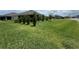 Well-manicured backyard featuring a lush green lawn at 3769 Causey Ct, The Villages, FL 32163