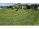 Expansive green backyard offering plenty of room for recreation and relaxation at 3769 Causey Ct, The Villages, FL 32163