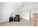 Bright bedroom features vaulted ceiling, ceiling fan, wood-look tile flooring, and closet at 3769 Causey Ct, The Villages, FL 32163