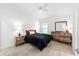 Bright bedroom features ceiling fan, wood-look tile flooring, and natural light at 3769 Causey Ct, The Villages, FL 32163