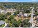 Aerial view displaying the home, backyard, and nearby lake and residential area at 378 W Osceola St, Clermont, FL 34711
